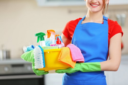 Professional cleaners tidying a W12 home after building work