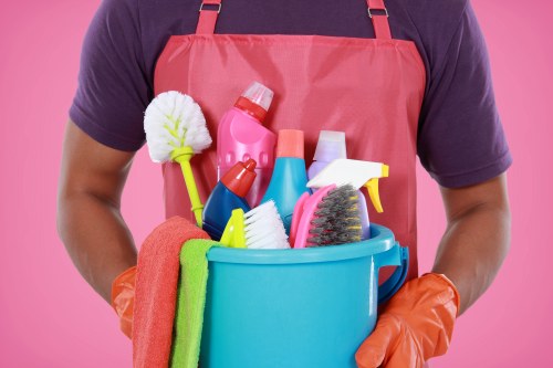 Clearance workers sorting items in a flat in the W12 area